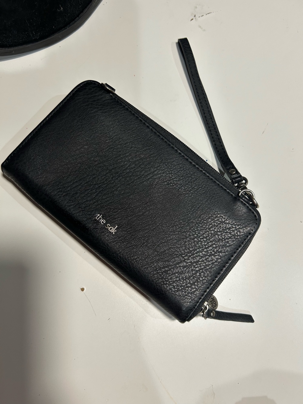 The Sak Black Leather Wristlet with Detachable Strap